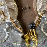 Pair of bronze wall lights and crystal pendants