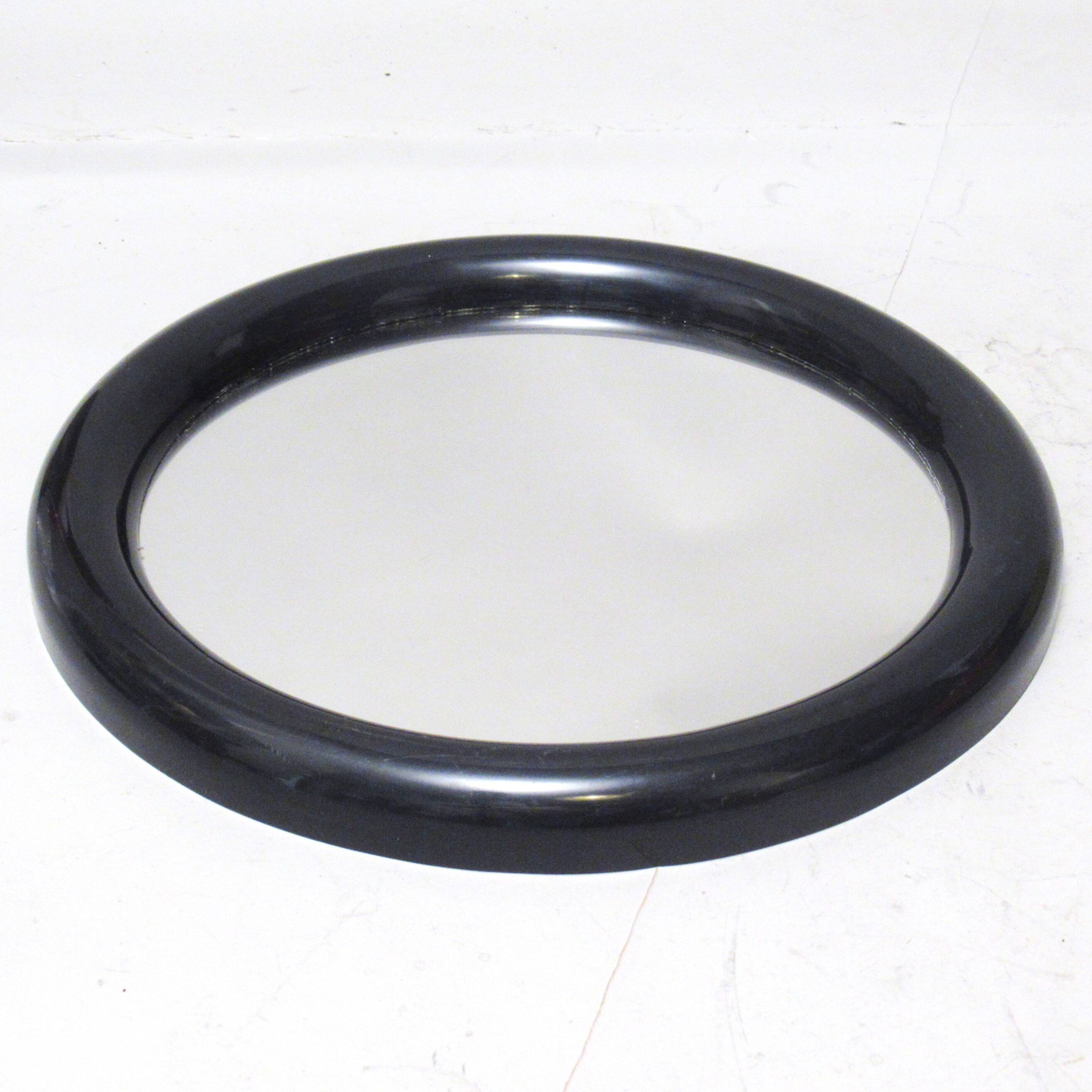 Round black plastic mirror 1970s