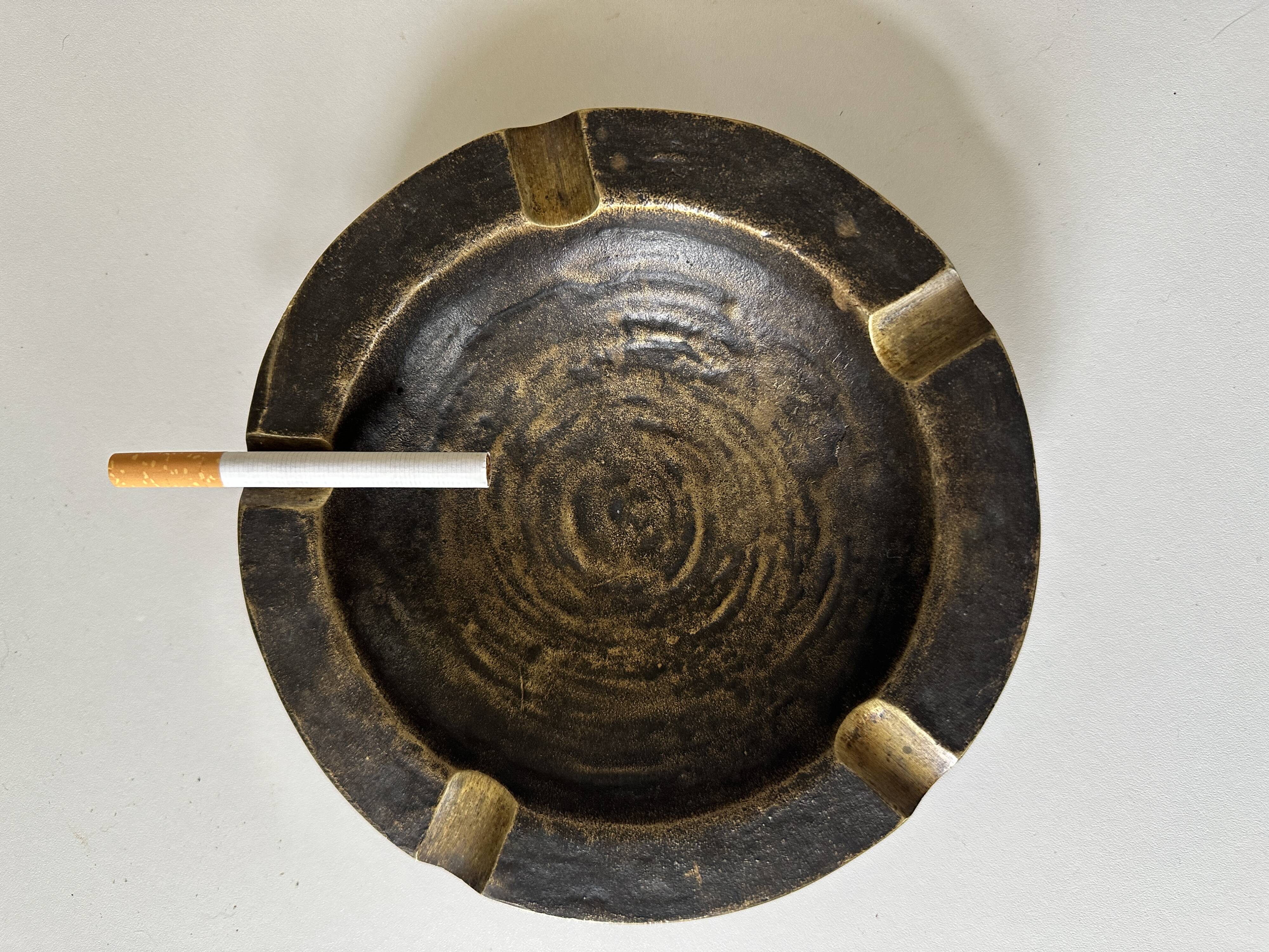 Vintage bronze ashtray design from the 60s