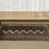 English coffee table in rosewood with tiled section from the 1970s.