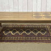 English coffee table in rosewood with tiled section from the 1970s.