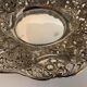 Empty open silver metal pocket