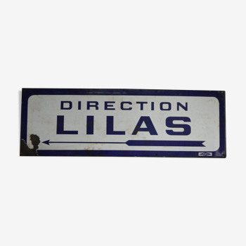 Enamelled plaque of the Paris metro towards Lilas