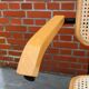 Cesca model chair designed by Marcel Breuer with black-framed armrests