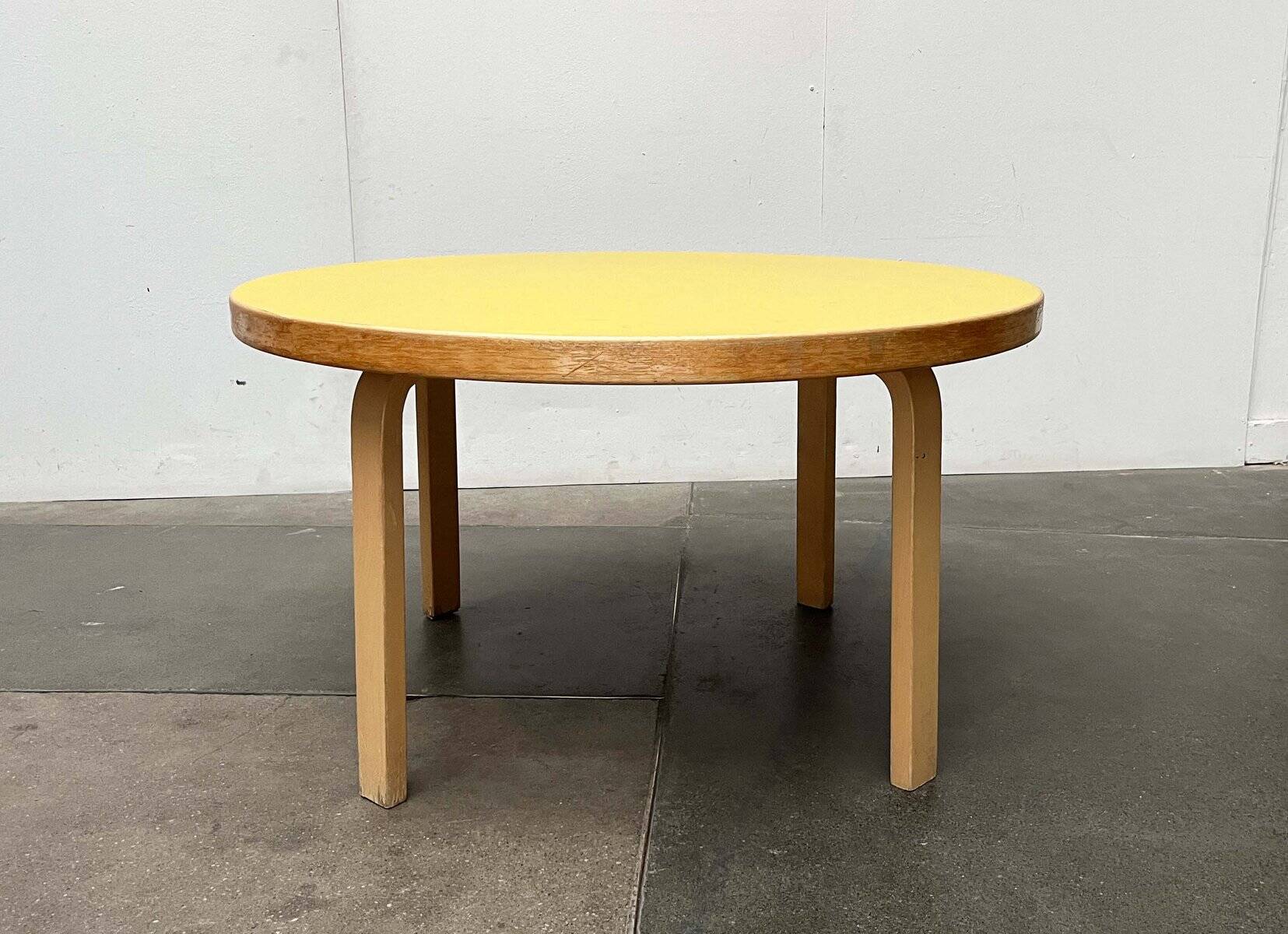 Mid-century modern yellow linoleum coffee table by Alva Aalto for Artek, Finland, 1960s.