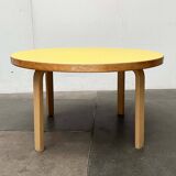 Mid-century modern yellow linoleum coffee table by Alva Aalto for Artek, Finland, 1960s.
