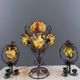 Set of three lamps in bronze and polychrome Murano glass, 20th century