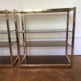 Pair of consoles brass shelves and smoked glass design Roche Bobois