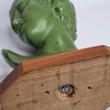 Bust of Eros in patinated plaster in imitation of bronze on wooden base