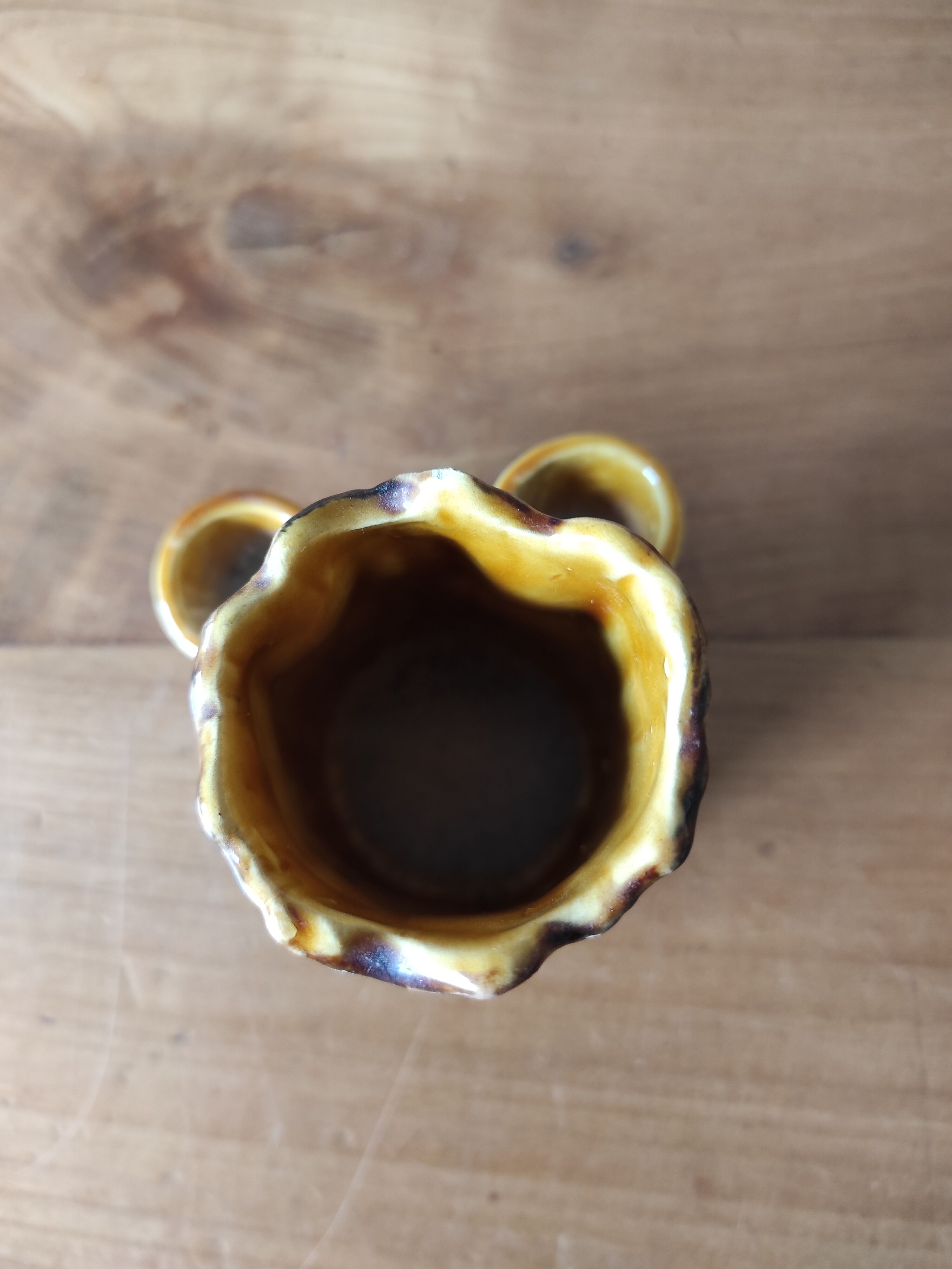 Ceramic vase with tree trunk decoration