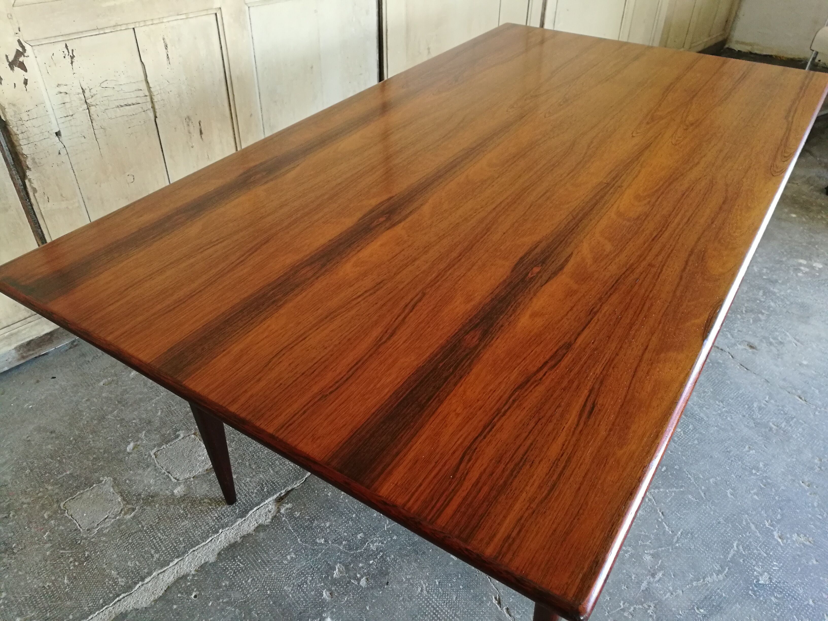 Scandinavian dining table in rosewood