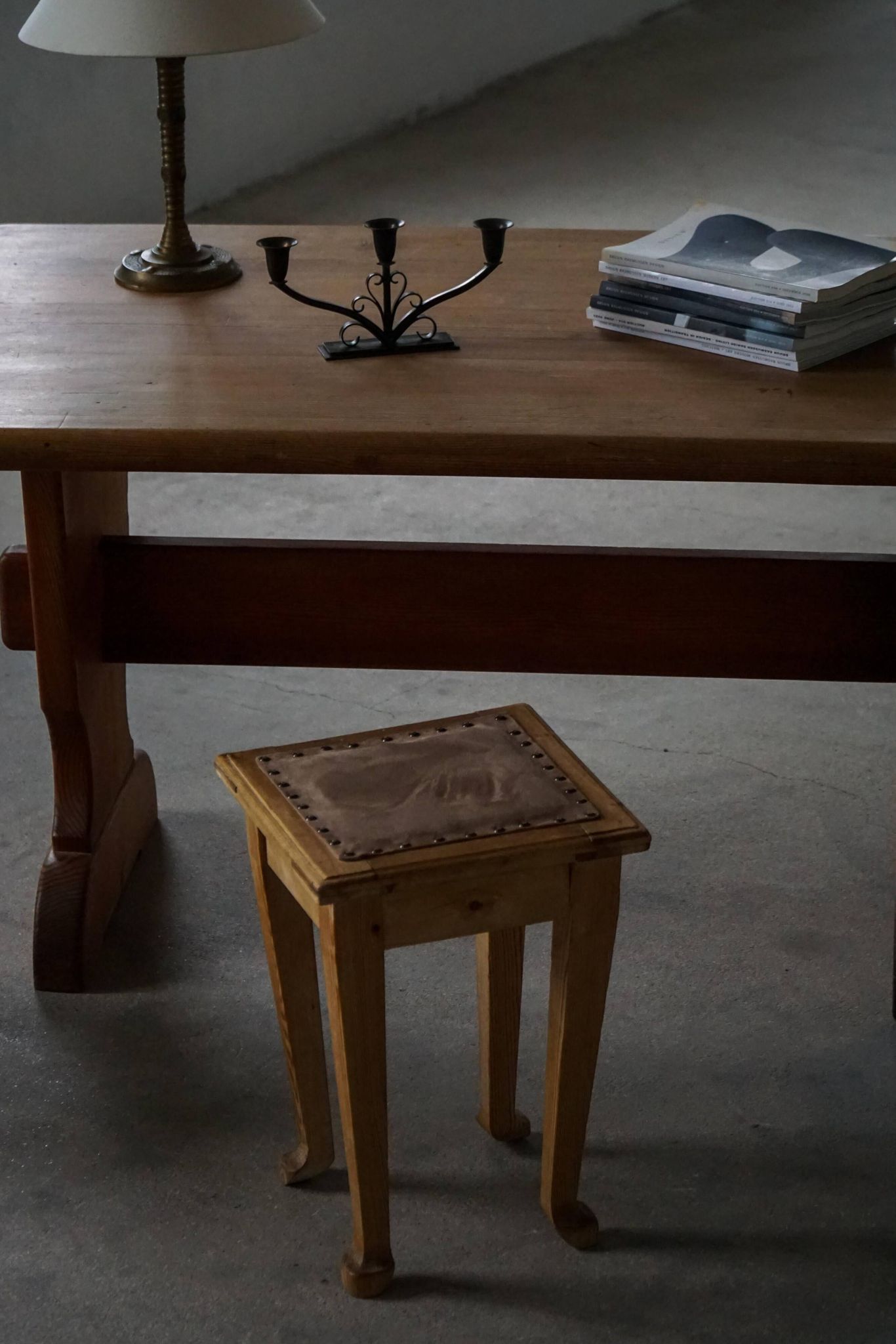 A pair of antique Danish pine stools from the late 19th century.