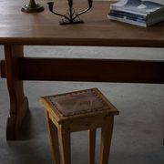 A pair of antique Danish pine stools from the late 19th century.