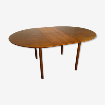 Extendable round dining table