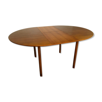 Extendable round dining table