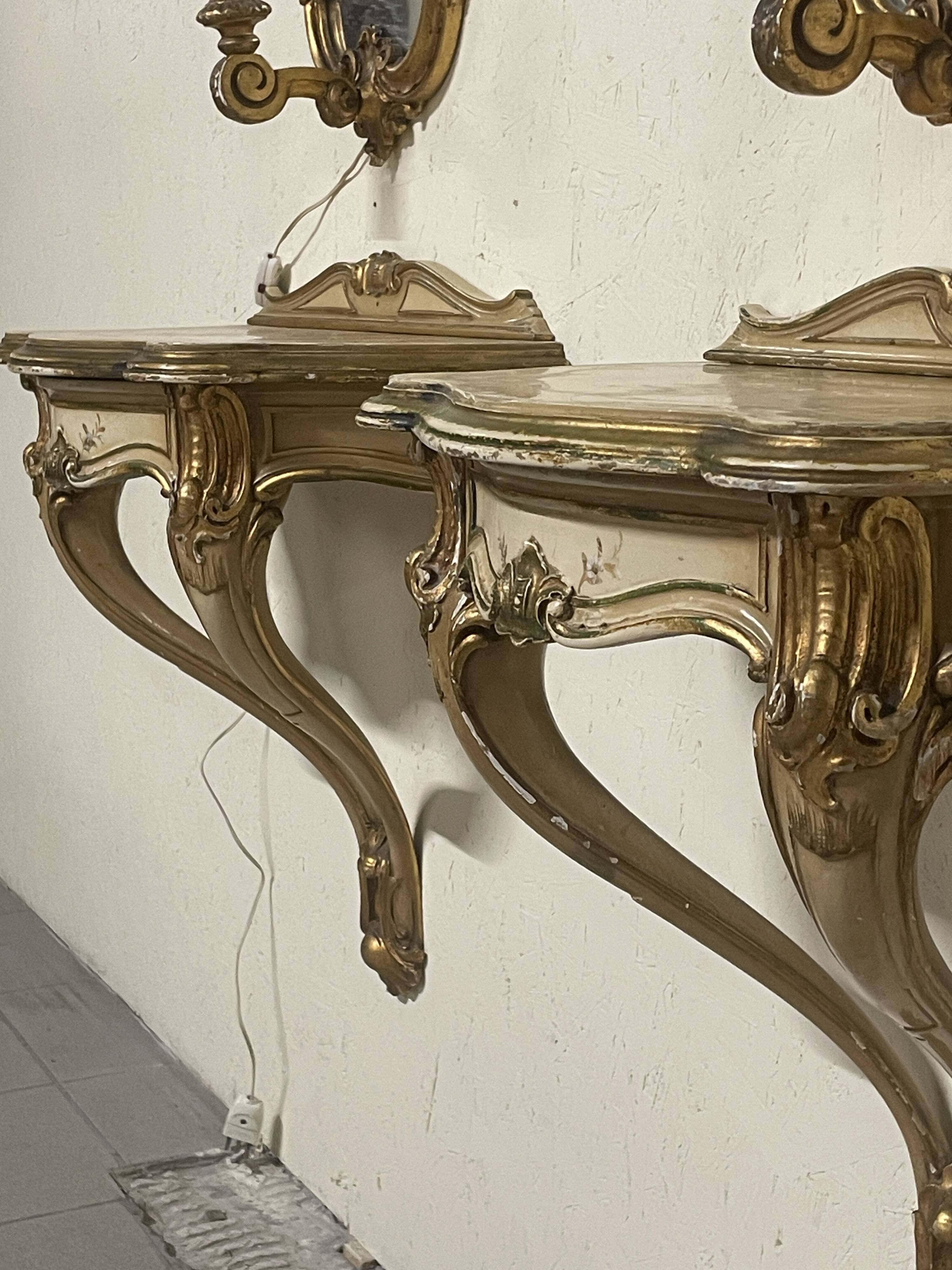 Pair of wall-mounted consoles with a mirror in Louis XV style.