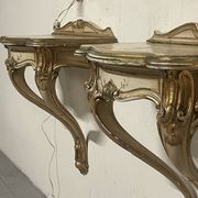 Pair of wall-mounted consoles with a mirror in Louis XV style.