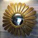 Miroir soleil, œil de sorcière, en bois doré vers 1960-70