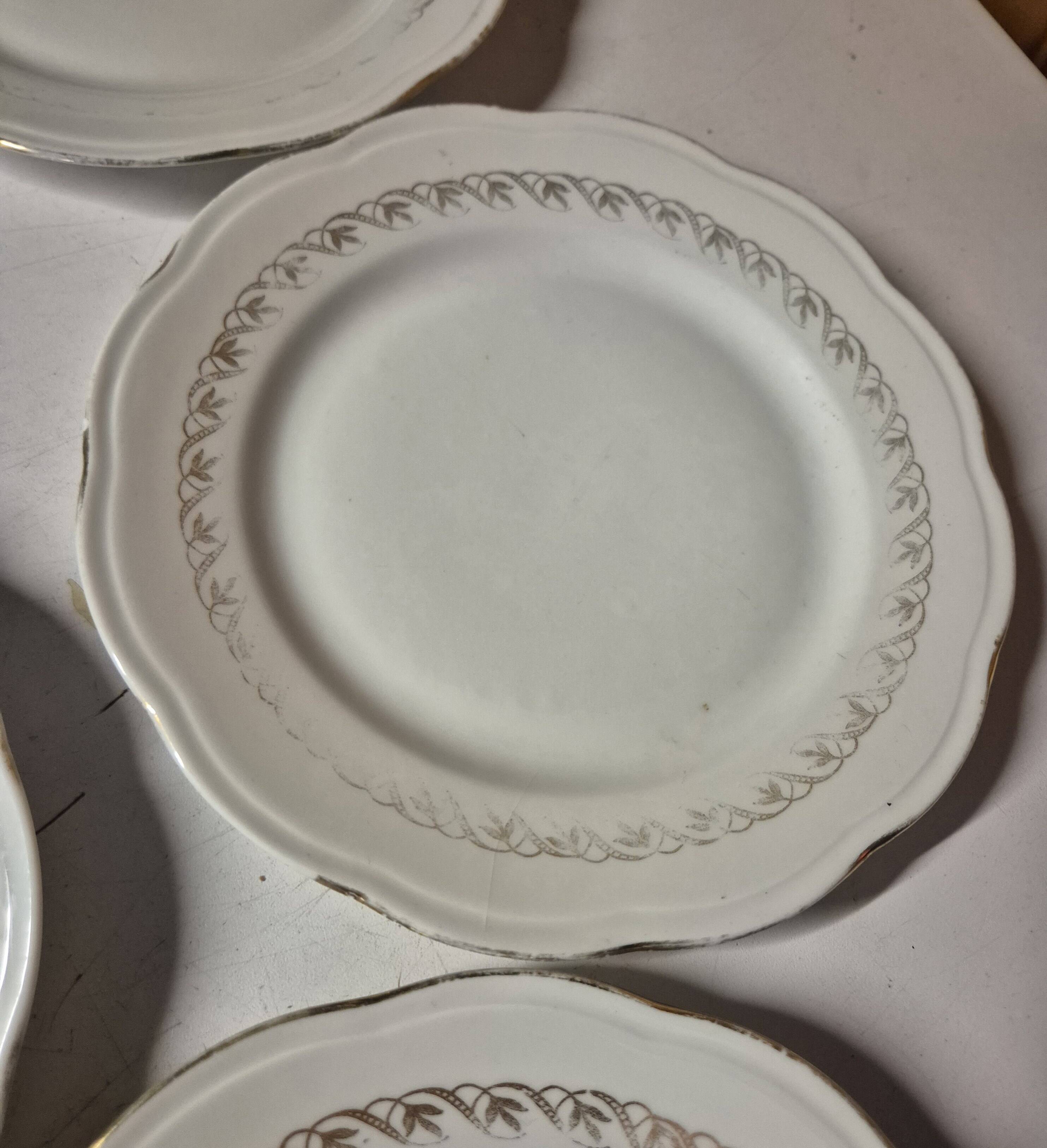 Set of 7 fine porcelain dessert plates with gilding, SFP, French company