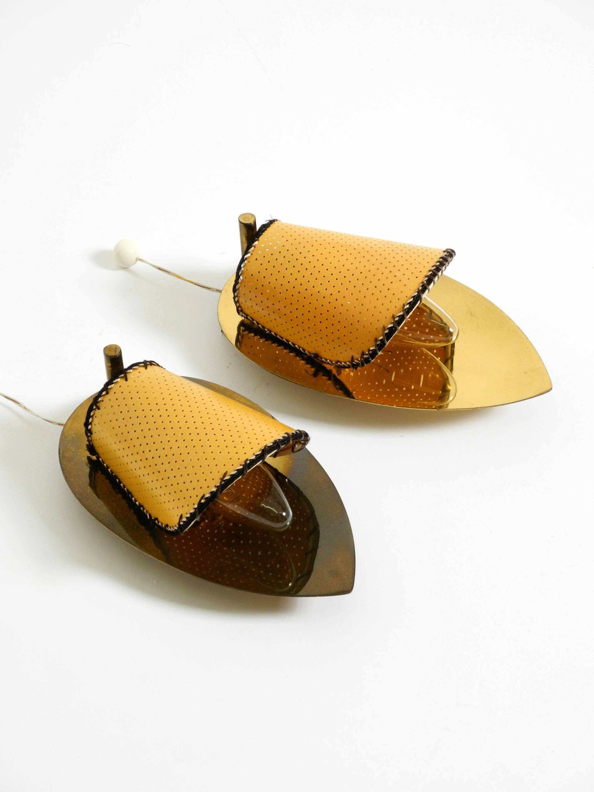 Two enchanting original Mid Century Modern brass wall lamps