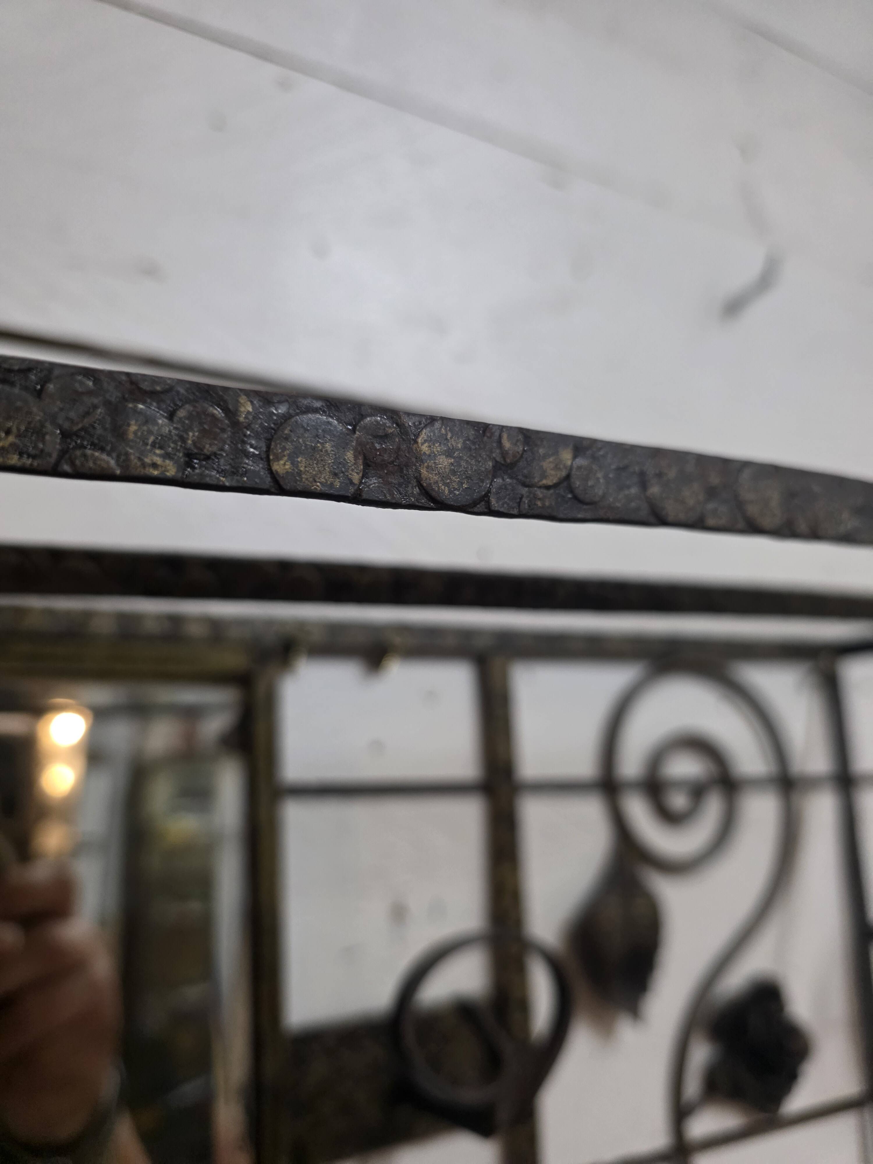 Art Deco coat rack in hammered wrought iron, 1950s.
