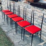 Six steel and brass chairs attributed to Carlo de Carli