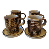 Set of 4 coffee cups and saucers