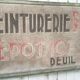 former big wooden advertising sign
