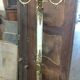 Coat holder on onyx and gold metal foot