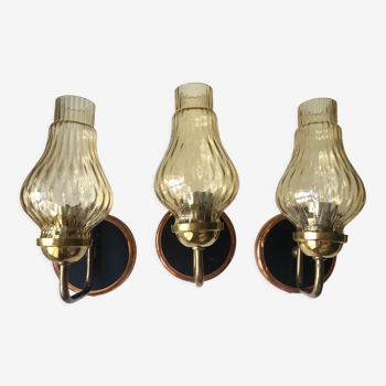 Three wall lamps in brass copper and smoked glass 1970