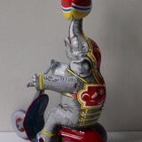 Vintage mechanical toys 'JW /Germany Western' 'Elephant on scooter'