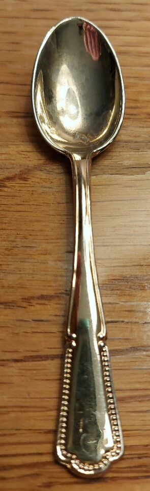 Chopper or vintage chiseled candy and its small spoon