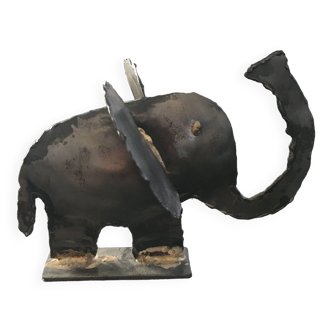 Metal elephant paperweight