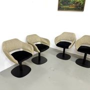 Series of six swivel chairs with organic shell, mottled fabric and base dis