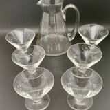 Glass and carafe set with chiseled flower motif