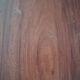 Round wooden table with thin legs