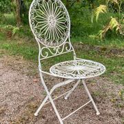 Foldable medallion garden chair from the 20th century in wrought iron with Heart motifs