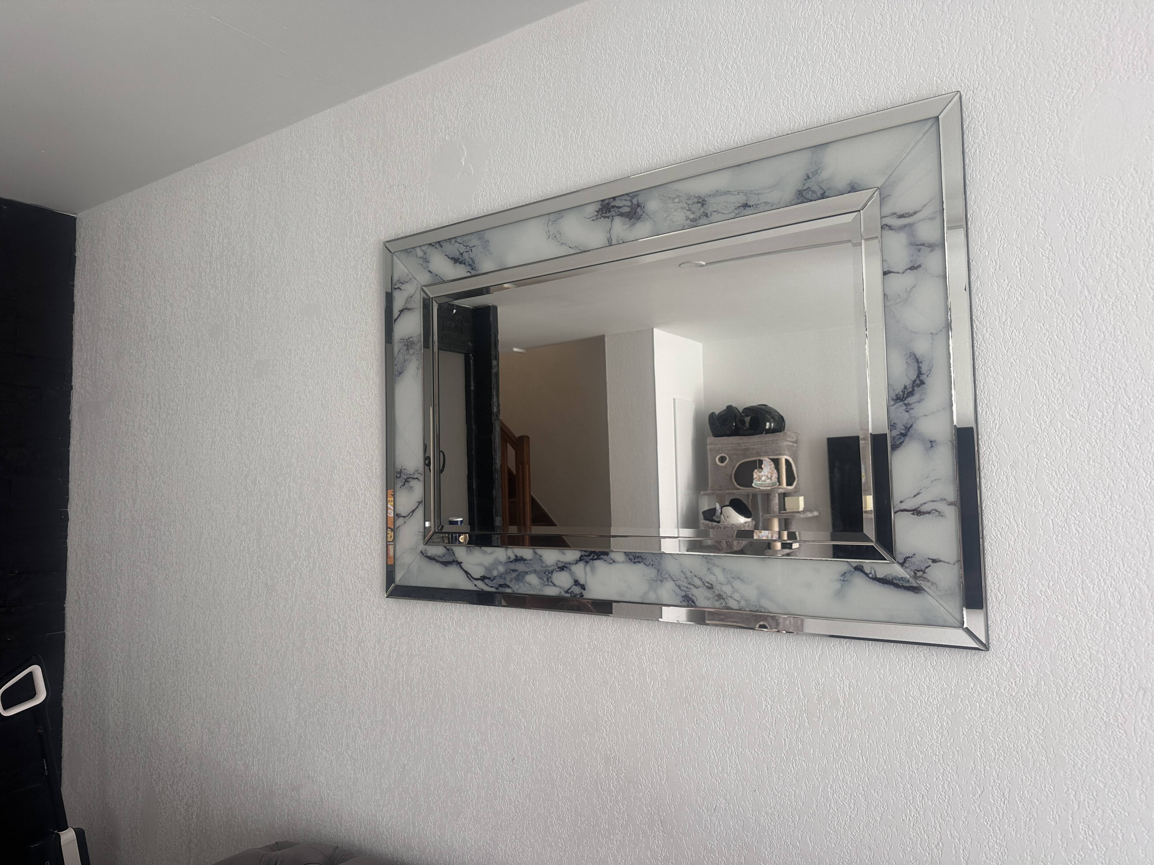 Large marble effect mirror