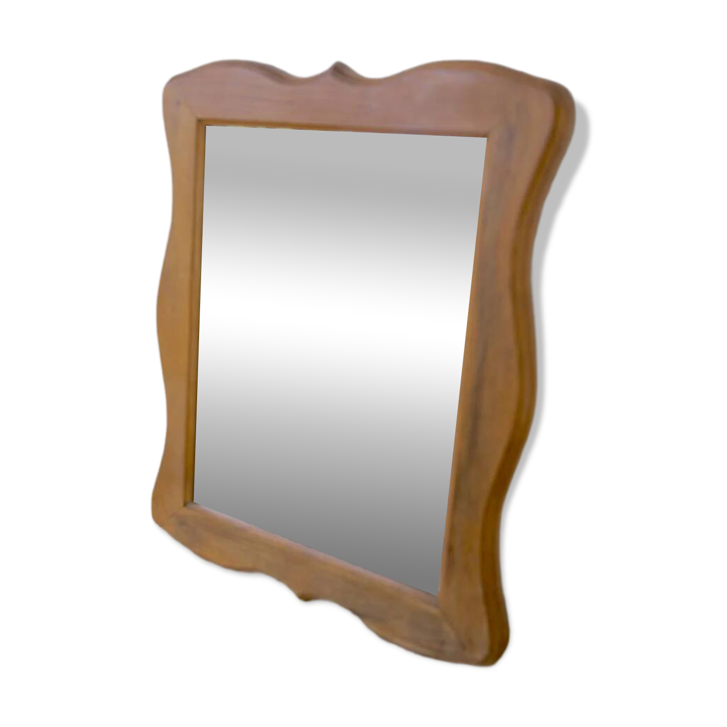 Wooden mirror with a shaped frame