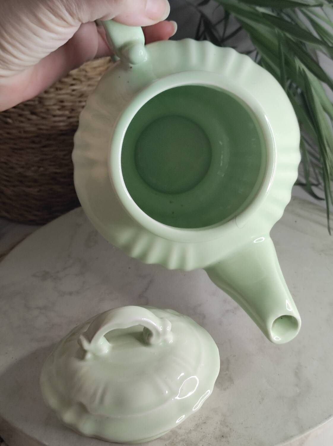 Green ceramic teapot
