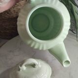 Green ceramic teapot