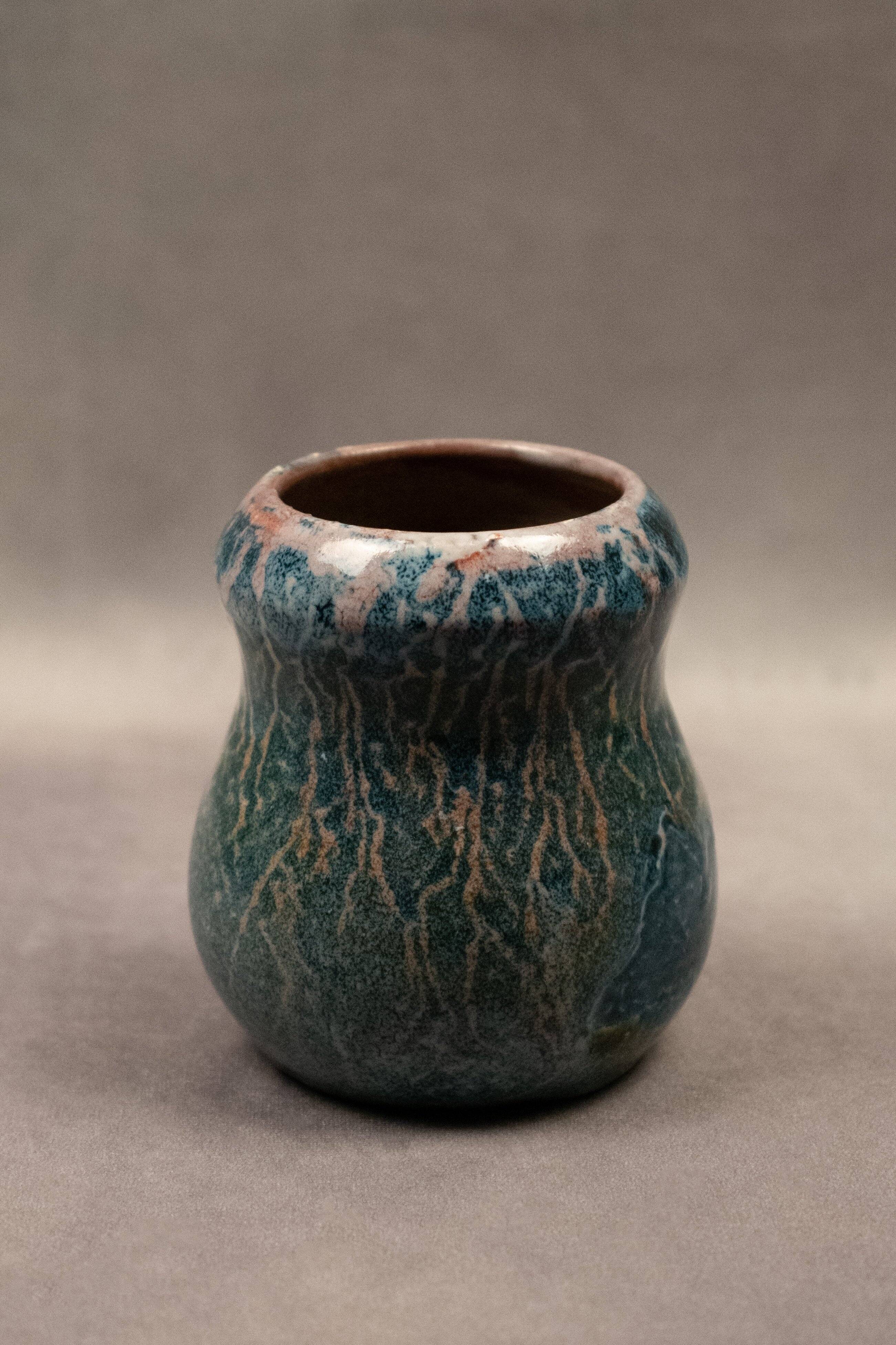 Small flamed stoneware vase in shades of blue and orange