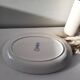 Keller and Guérin Lunéville serving dish with blue flowers on a white background.