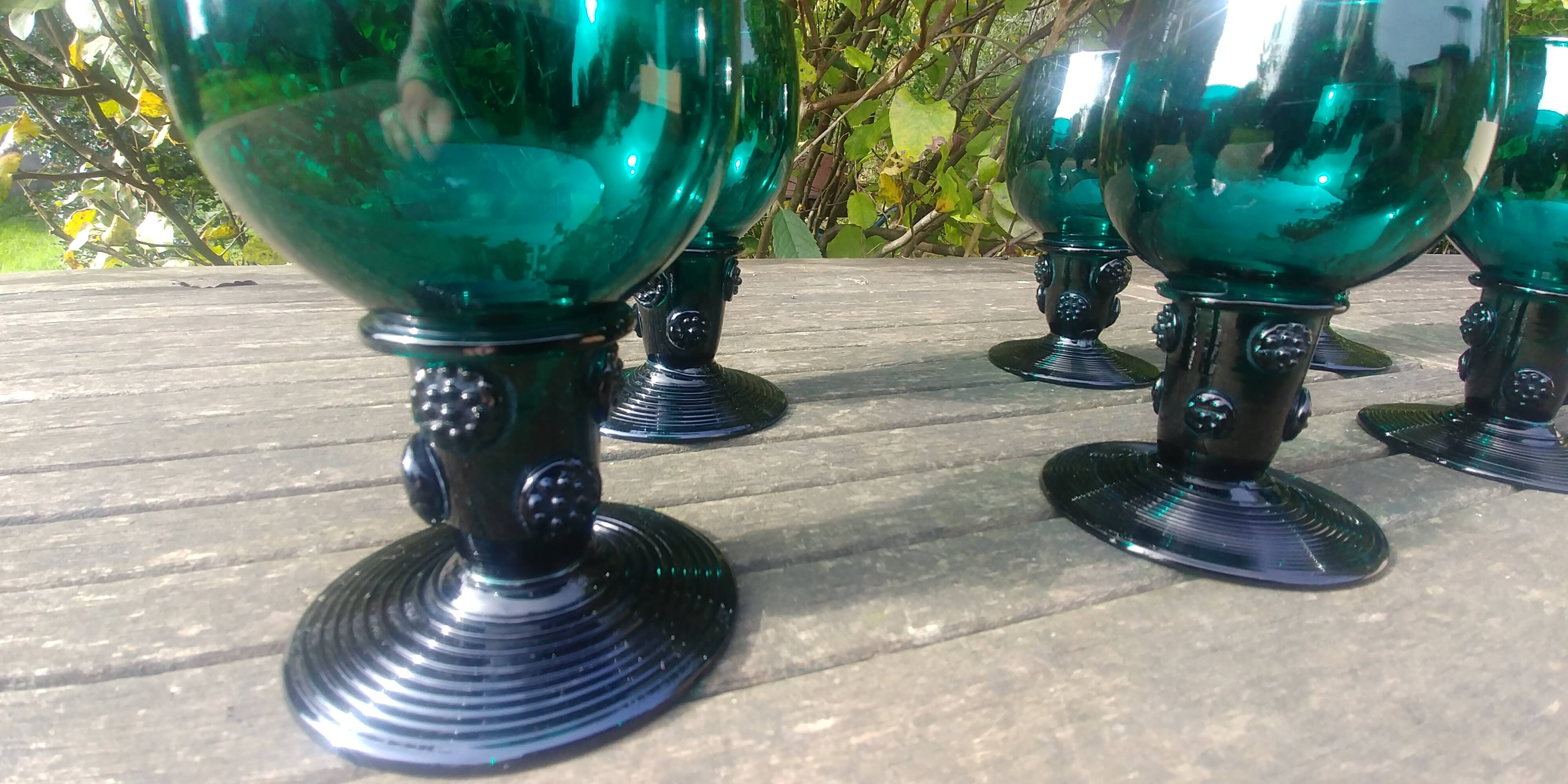 Six Roemer glasses in green blown crystal with "pastilles" decoration
