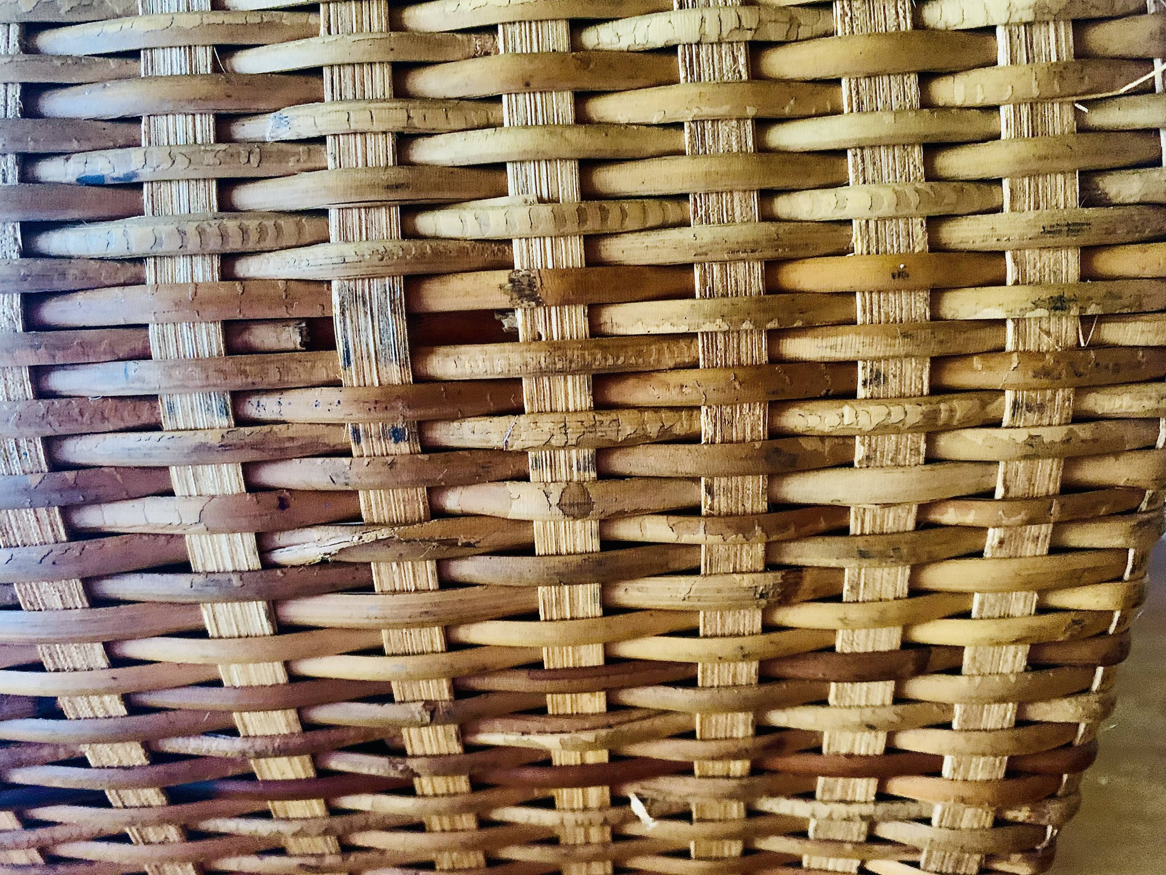 Large vintage rattan and wicker sewing basket with fabric seat