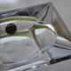 Antique crystal ashtray with its leather stand