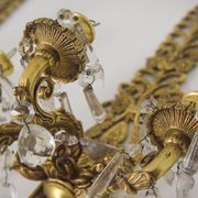 Deux appliques murales en bronze et en verre coupé