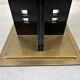 Hollywood regency coffee table / side table black and gold