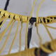 Pair of 60s tripod armchairs in metal and yellow scoubidou