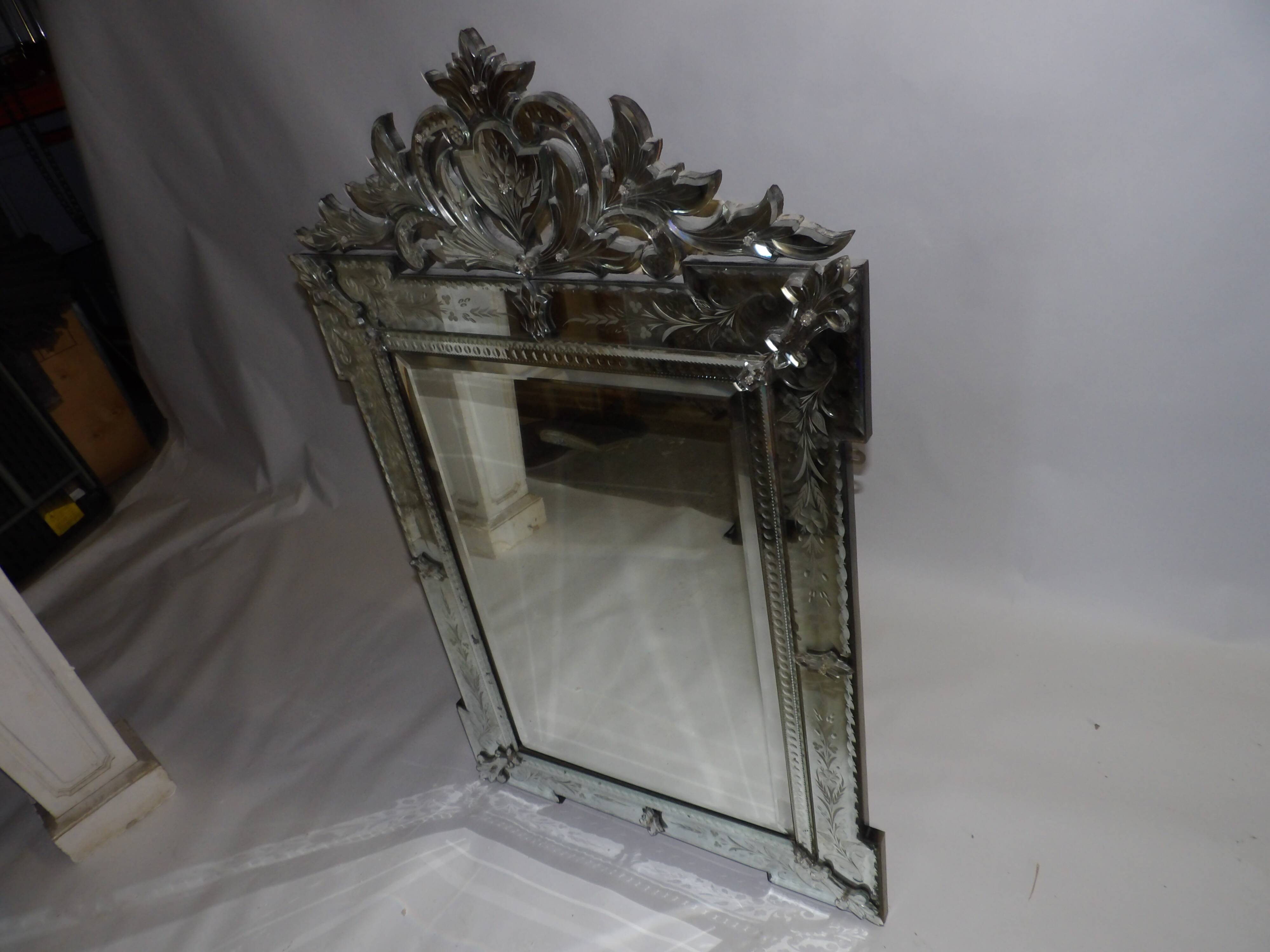 Richly decorated Venetian mirror